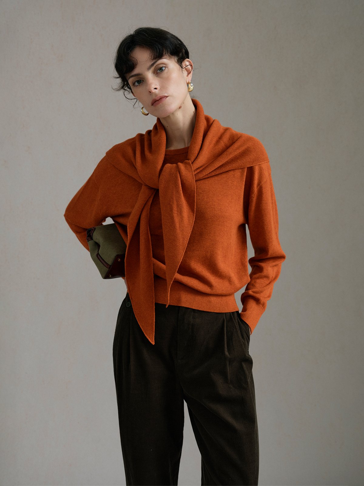 Product View of NIA Lightweight Knit Triangle Scarf in Orange.