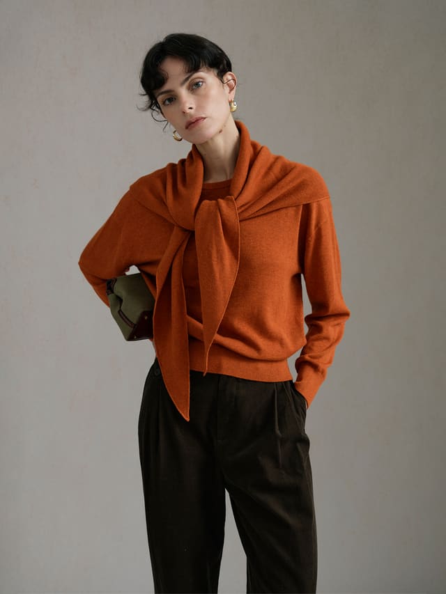 Product View of NIA Lightweight Knit Triangle Scarf in Orange.