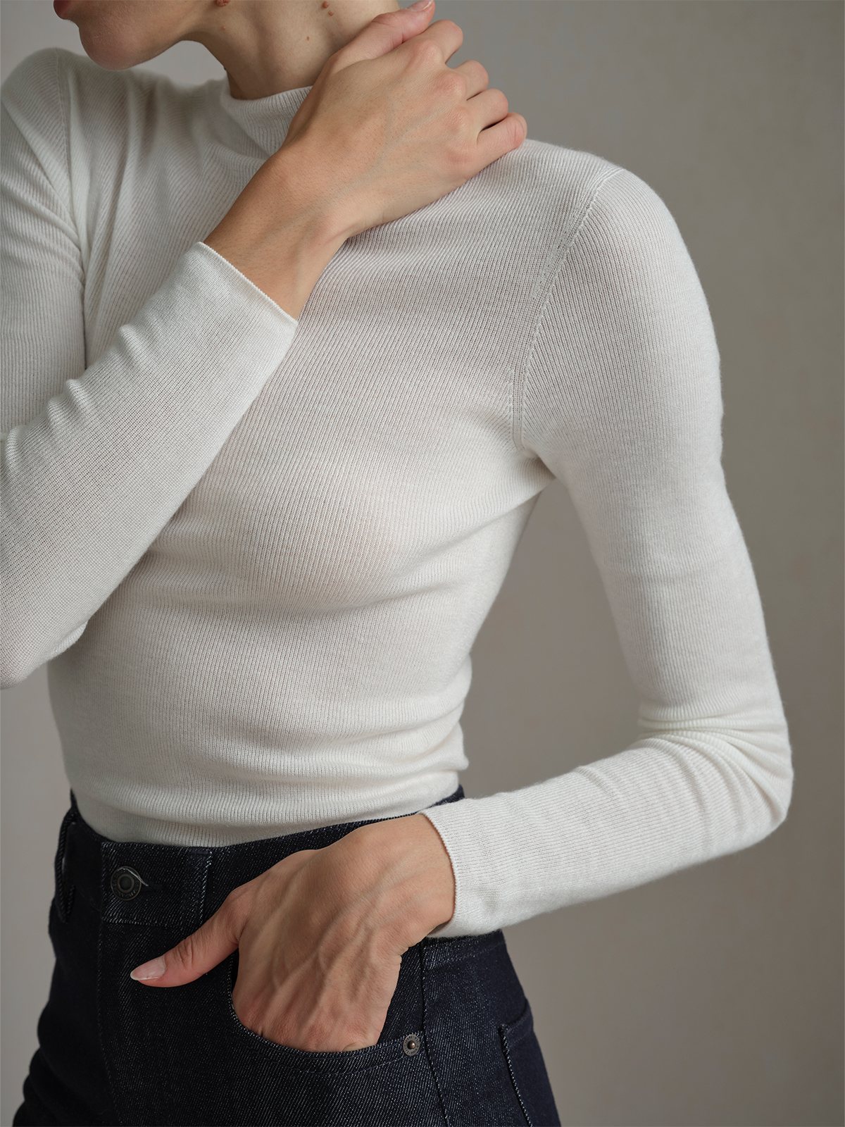 Product View of EASE Mock Neck Seamless Fitted Base Layer in Off-White.