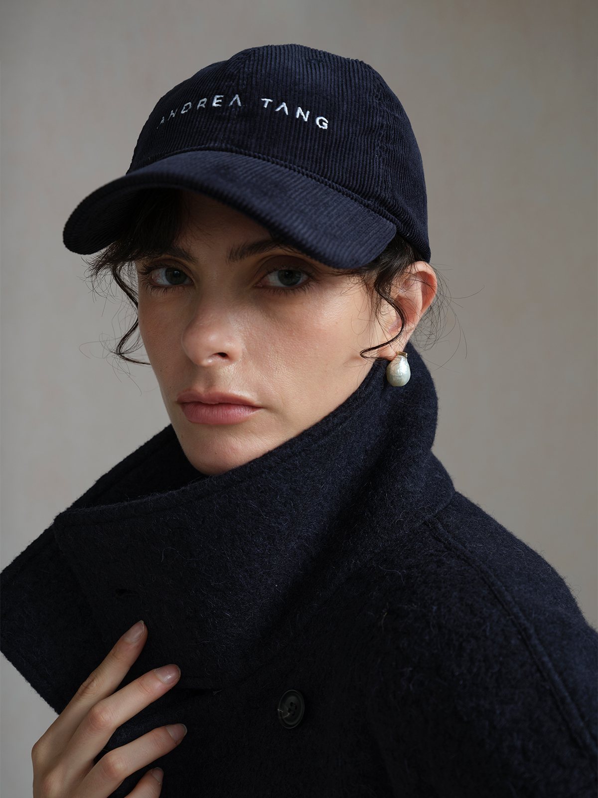 Product View of AT26 Corduroy Baseball Cap in Navy.