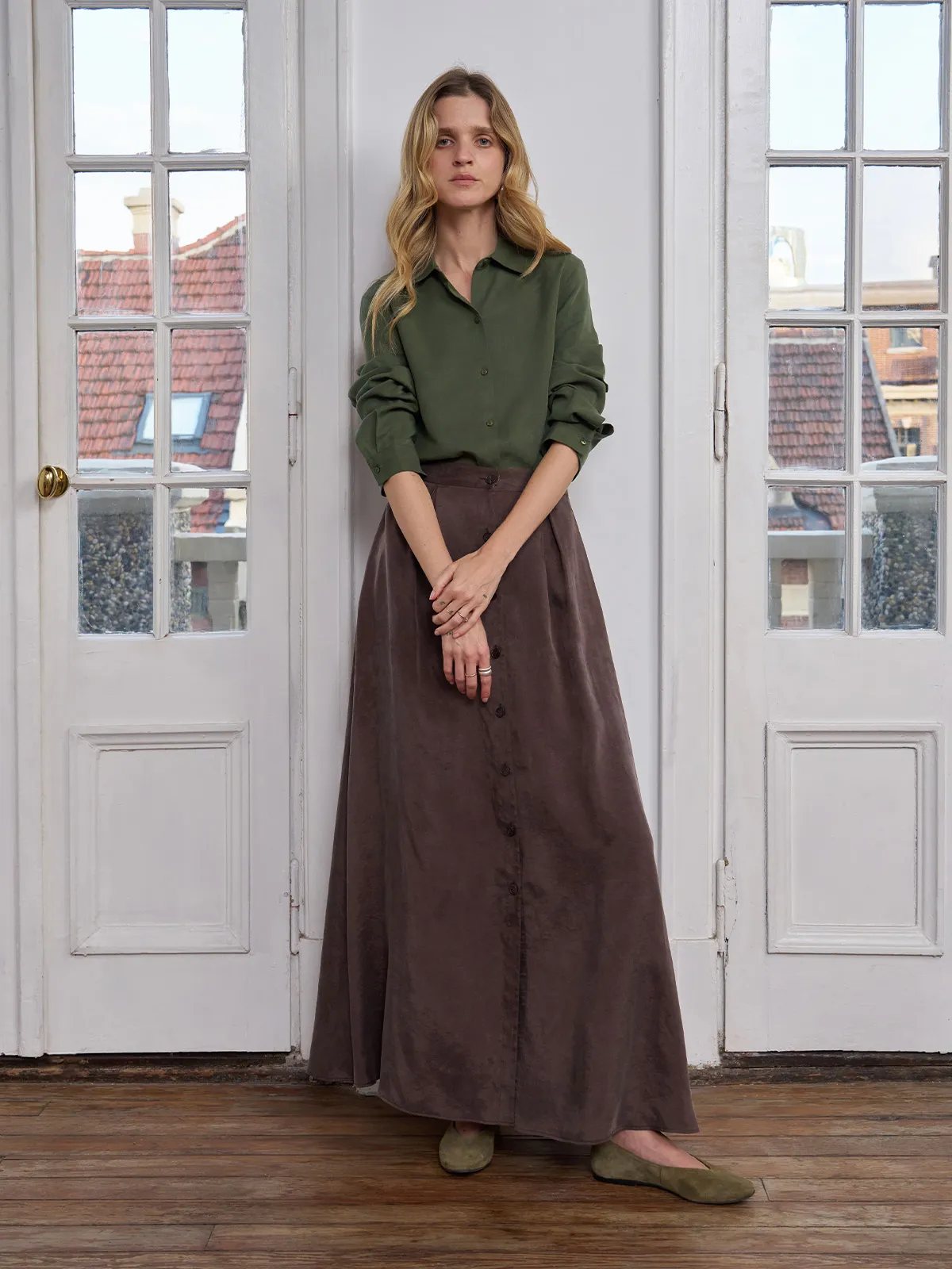 Full-length front view of ERIN Shirt with long brown skirt and green flats — serene minimalist styling