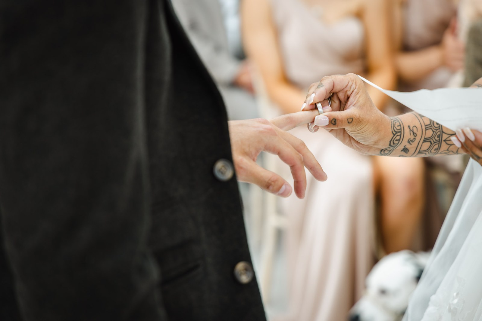 Close-up of the ring passed between the couple during the ceremony