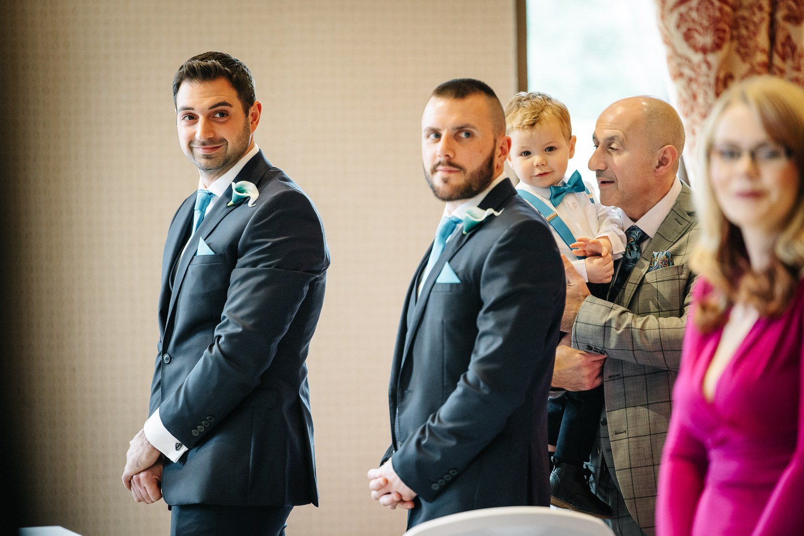 The groom and best man waiting at the front before the ceremony