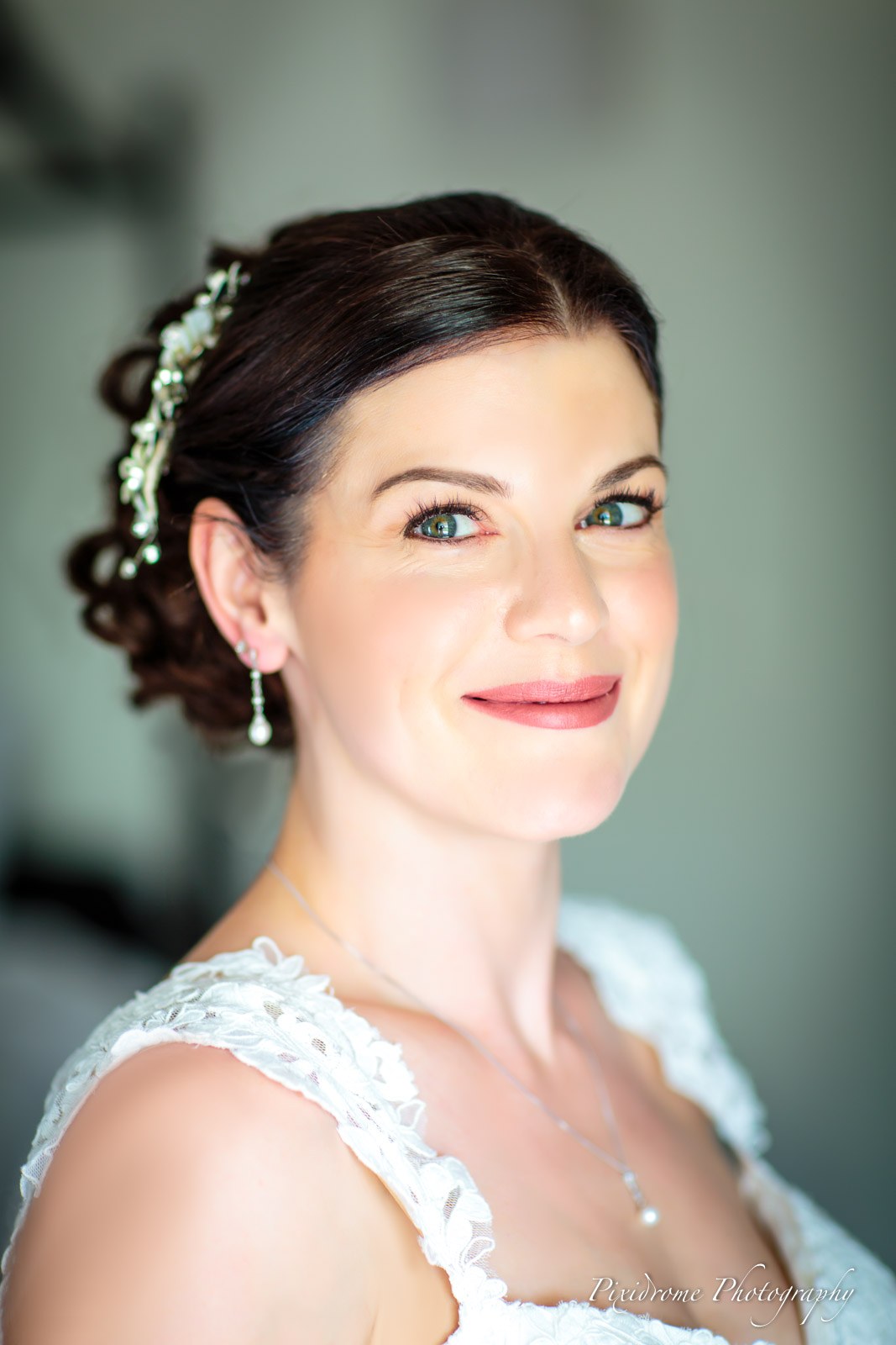 Soft portrait of the bride with her hair dressed up