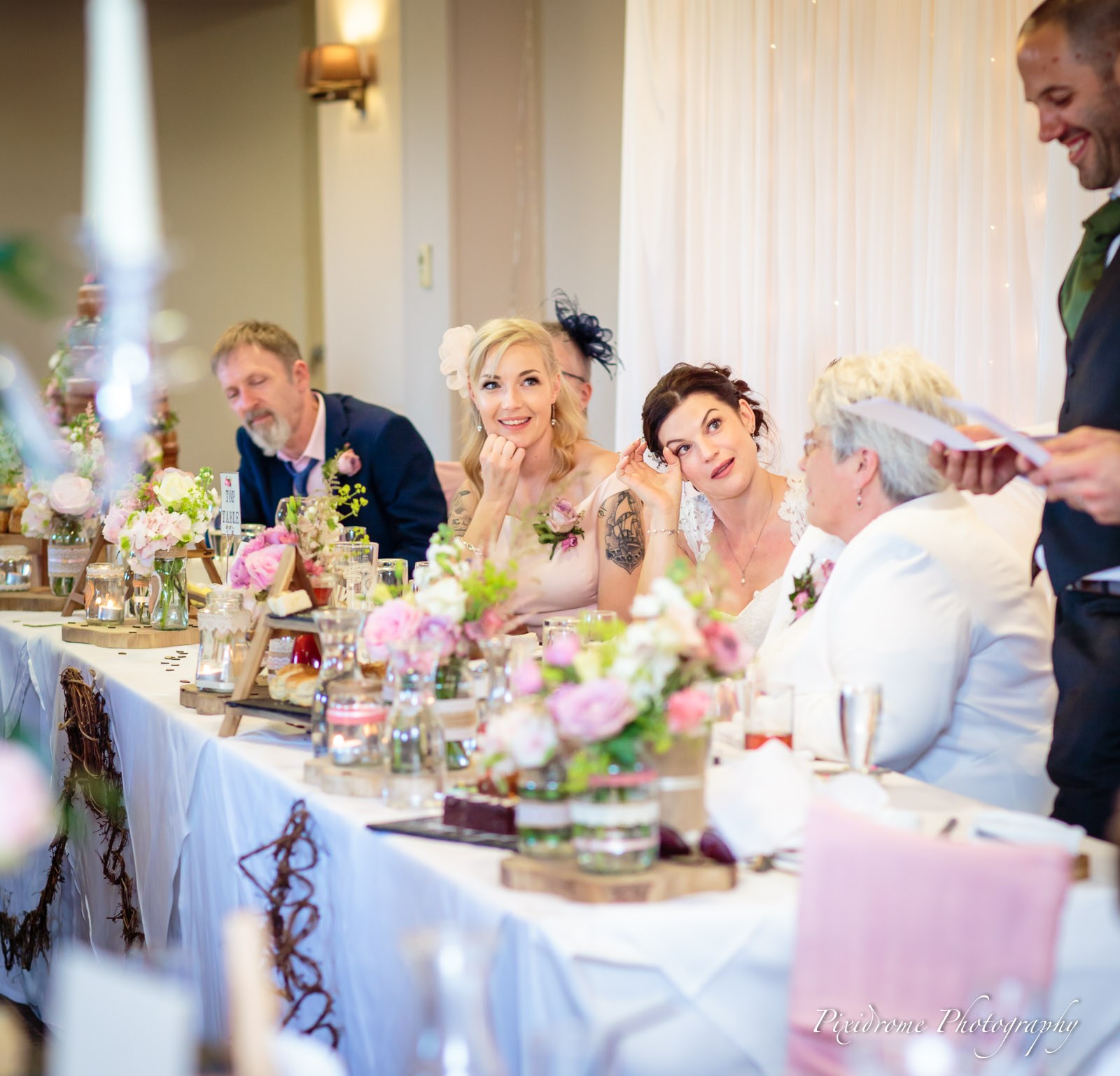 Guests at the top table listening during the speeches