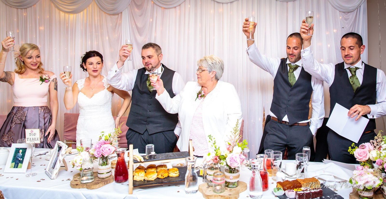 A toast raised along the top table at Highfield Park