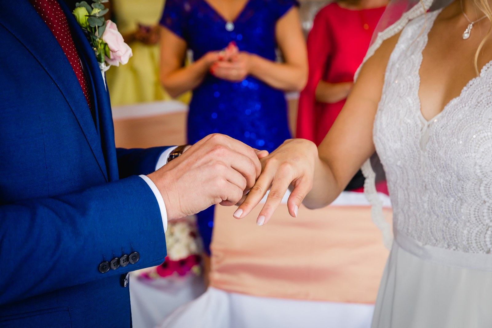 Close-up of the couple exchanging rings during the ceremony