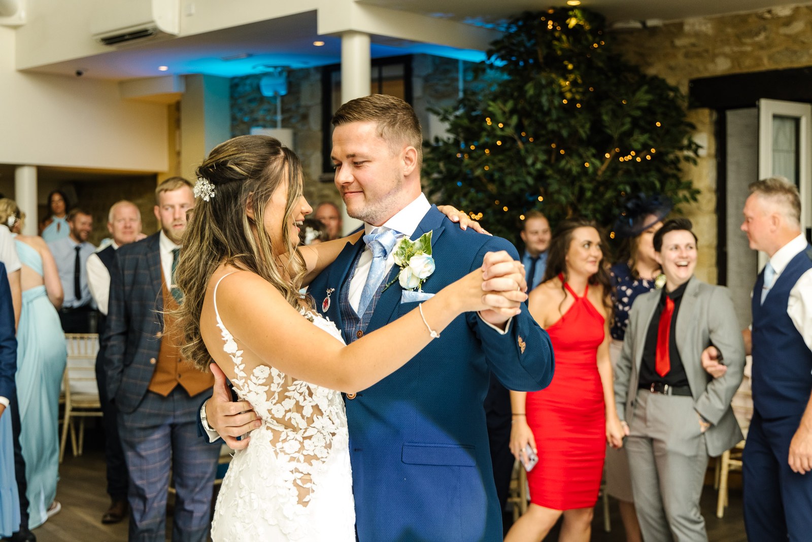 Bride and groom sharing their first dance at voco Oxford Thames