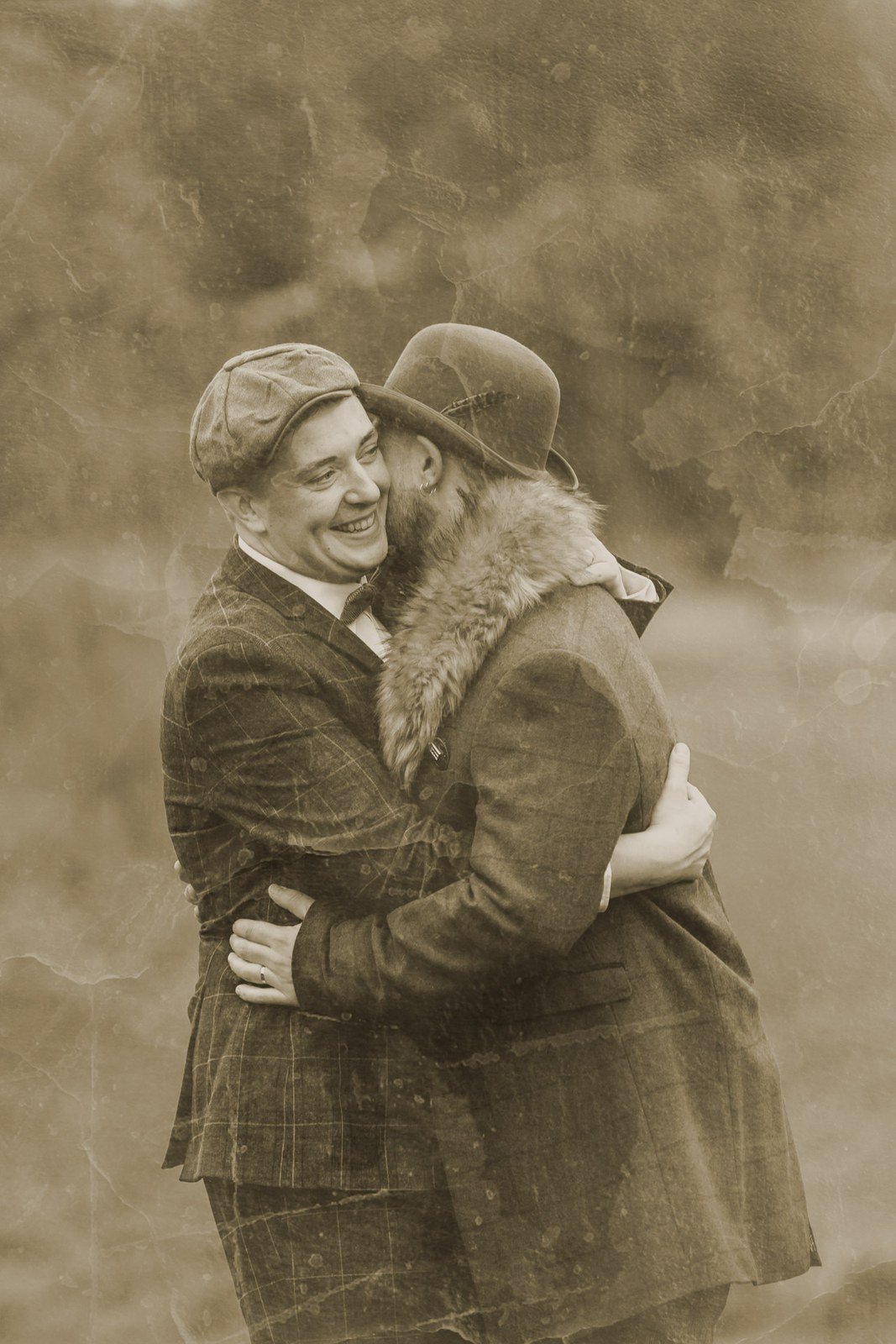 Sepia vintage-style portrait of the grooms in a close embrace