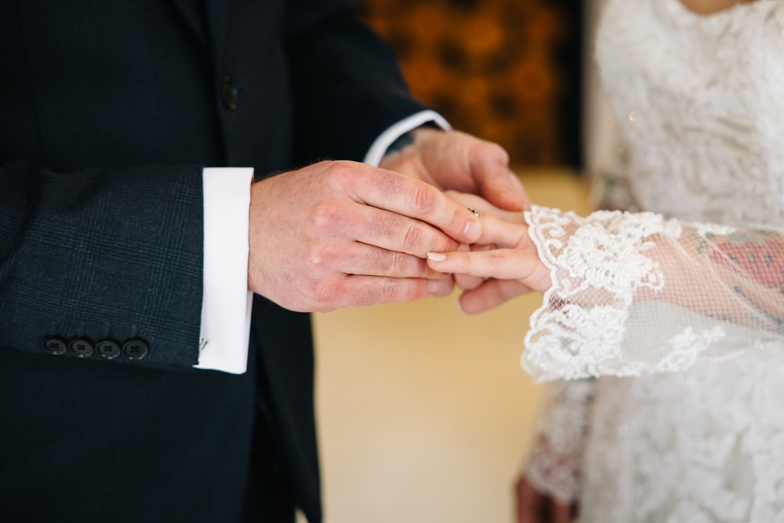 Close-up of the ring exchange during the ceremony