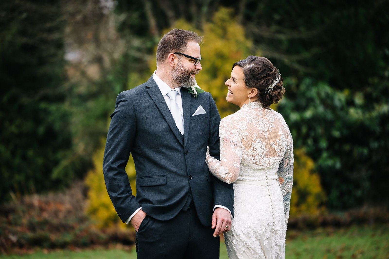 The couple gazing at each other in the gardens at Woodlands Lodge Hotel