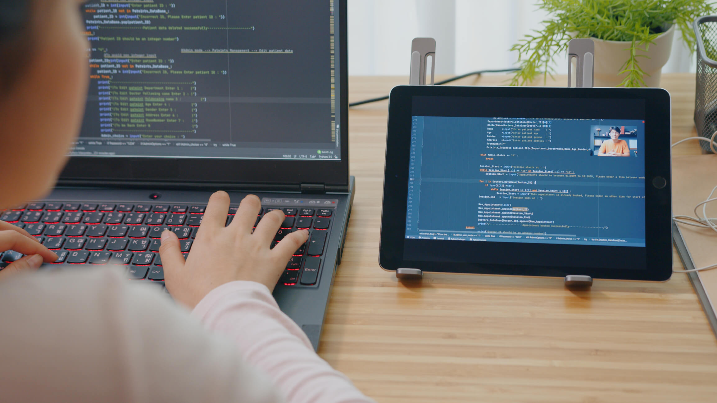 young kid coding on laptop