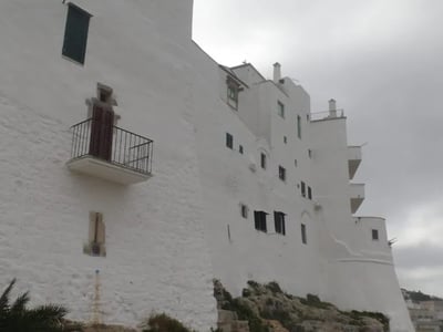 White cliffs of Ostuni, typical of Mediterranean architecture, offering a spectacular panoramic view of the sea.