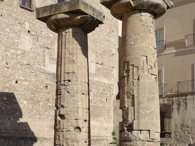 Ancient columns of the Temple of Poseidon, showcasing classical Greek architecture in Athens.