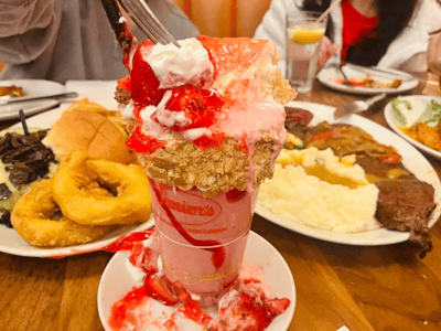 Cheesecake with cherry sauce and crumble, famous at Junior's, a hot spot for desserts in New York.