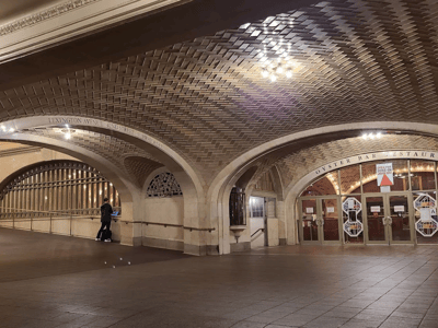 Whispering Gallery at Grand Central with its distinctive arches and subtle lighting, showcasing the architectural beauty of New York.