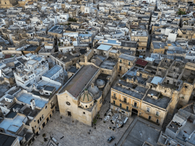 Panoramic view of Grottaglie, showcasing the traditional roofs and historical architecture of the city center.