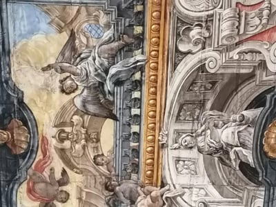 Plafond richement décoré du Duomo de Matera, illustrant des scènes bibliques avec des détails baroques.