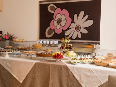 Savory buffet at Palazzo Indelli, with cakes, fresh fruits, and a dessert buffet, perfect for a brunch.