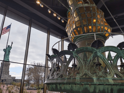 The interior of the flame of the Statue of Liberty on Liberty Island, revealing architectural and historical details.