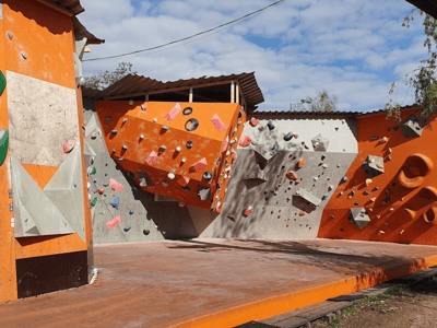 Colorful climbing wall at Bright Site, offering various routes and challenges for climbers of all levels.