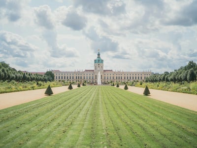 The Charlottenburg Palace, with its immaculate gardens and baroque architecture, attracts visitors in search of culture.
