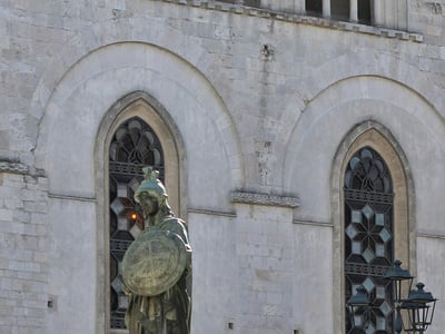 Statue of Minerva in front of the cathedral of Altamura, symbolizing local history and culture.