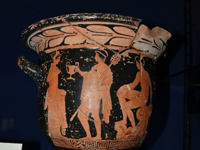 Ancient Greek vase illustrating a scene of dance and music, exhibited at the Colosso Museum.
