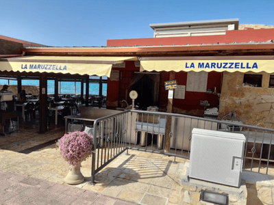 Restaurant La Marruzella with a view of the sea, offering a relaxed atmosphere to enjoy local dishes.