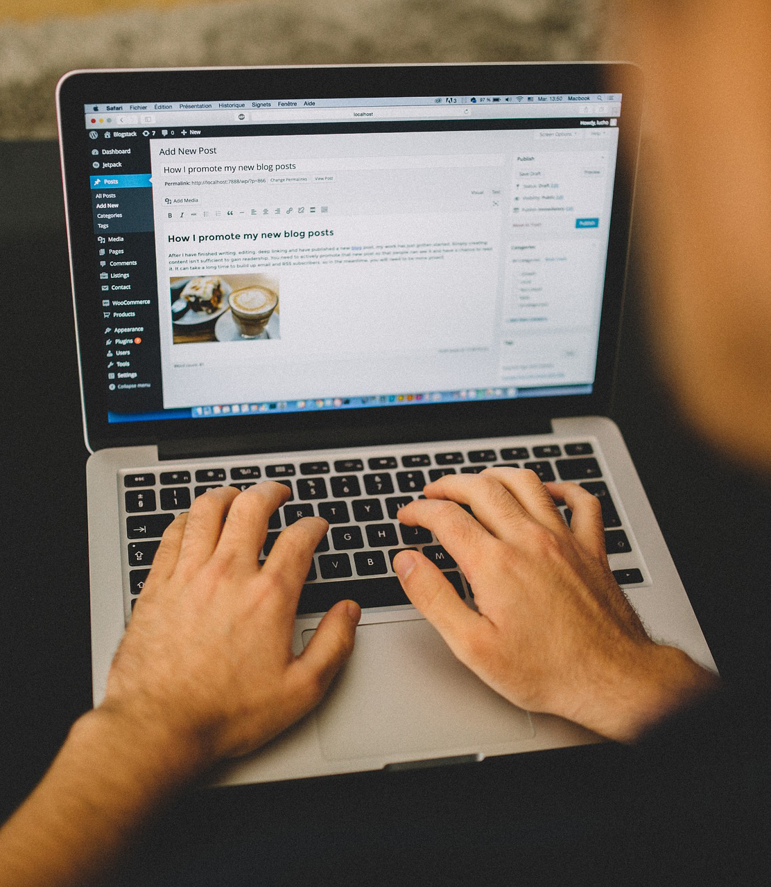 How WordPress 68 Benefits SmartHost Customers Person typing on a laptop, creating a new blog post in WordPress, with the blog editor and a photo of coffee displayed on the screen.