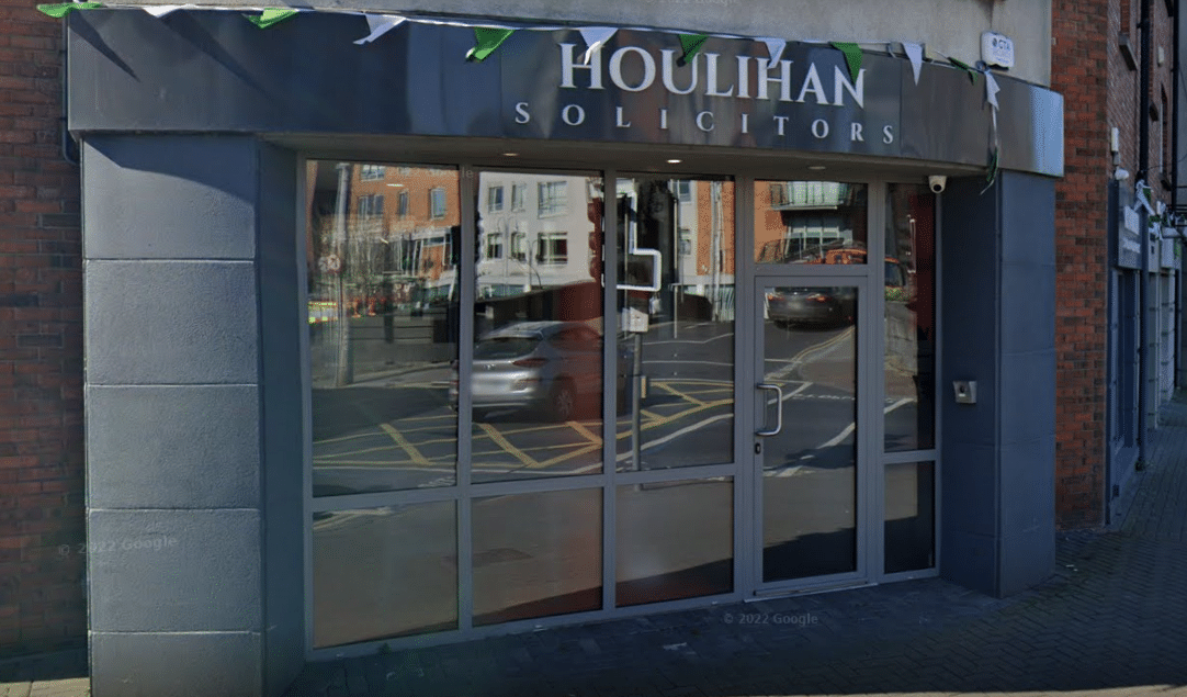 Houlihan Solicitors Shop Front The store has a glass front door.