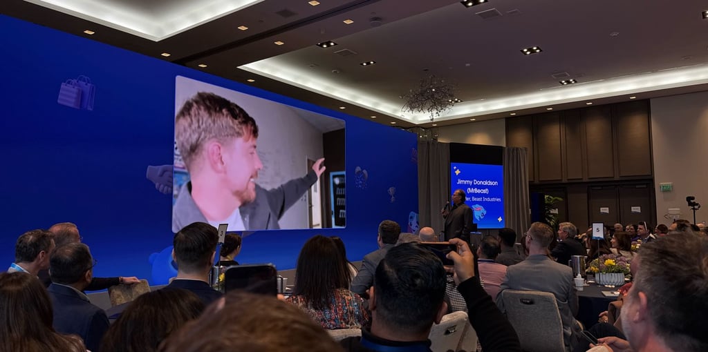 Jimmy Donaldson (MrBeast) joins Marc Benioff via video call on the main stage screen during the Salesforce Slackbot launch keynote at the St. Regis Hotel, San Francisco, March 31, 2026. The Beast Industries founder discussed how his 500-person company uses Slack and Slackbot to coordinate large-scale video productions. Photo: Vernon Keenan / SalesforceDevops.net