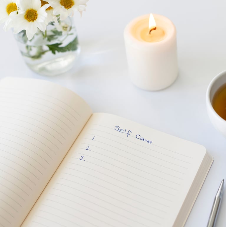 journal with self-care list