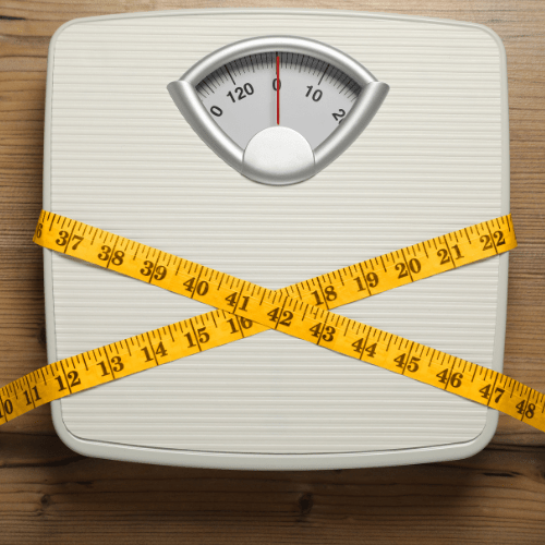 Weight loss scale with measuring tape.