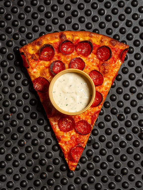 House cheese blend on a fresh-stretched dough