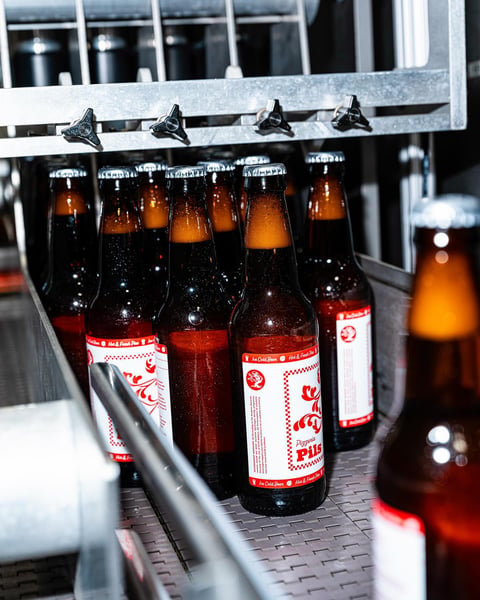 Big excitement around these parts for a fresh batch of Pizzeria Pils bottles!