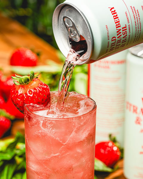 Through a sea of green, a fresh batch of Wild Strawberry