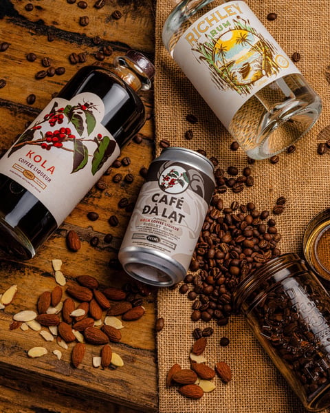 Cafe Dà Lat is a novel beverage featuring Kola Coffee Liqueur, Richley Rum, almond, our cold brew, &condensed milk.