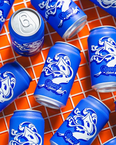 Razzy is our juicy raspberry seltzer made with butterfly pea flower.