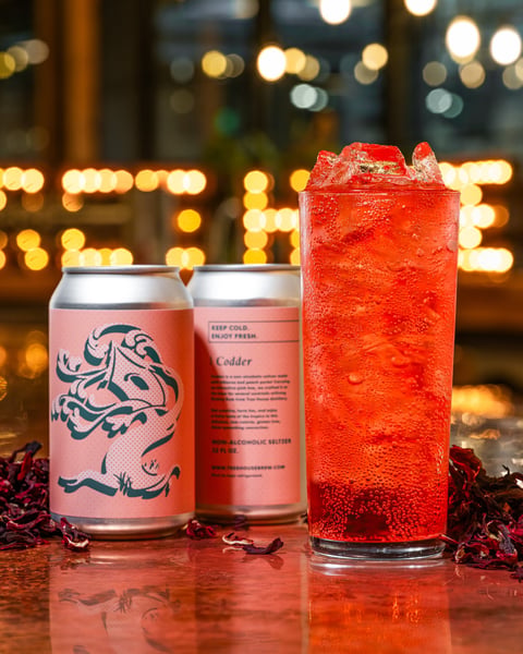 Codder is a non-alcoholic seltzer made with hibiscus and peach purée!