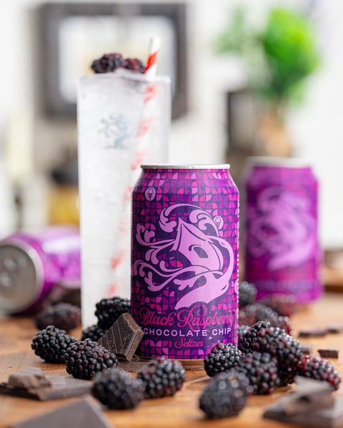 Black Raspberry Chocolate Chip Seltzer is filled with notes of juicy summer berries and a confounding hint of chocolate!
