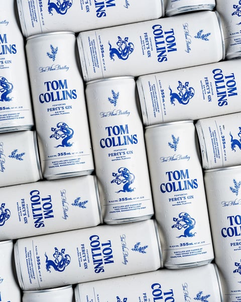 We have a mountain of fresh Tom Collins cans rolling down our sleek canning line this morning.