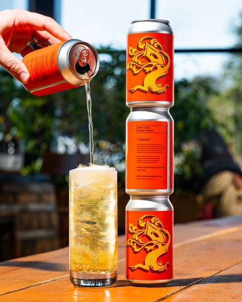 Starting the day with a little bit of Sunset, our tangerine and peach-filled seltzer.