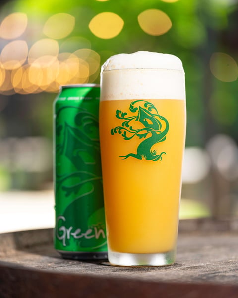 Green. We could stare at these vibrant cans all day, but we'd rather drink them.