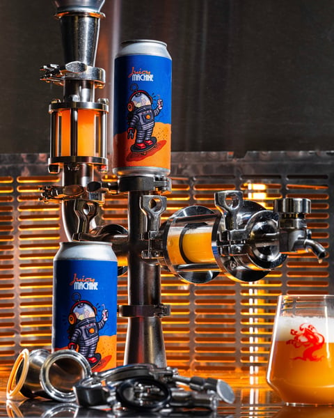 Juicy Machine appears from the heart of precision, an intricate dance of stainless steel valves, humming air compress…