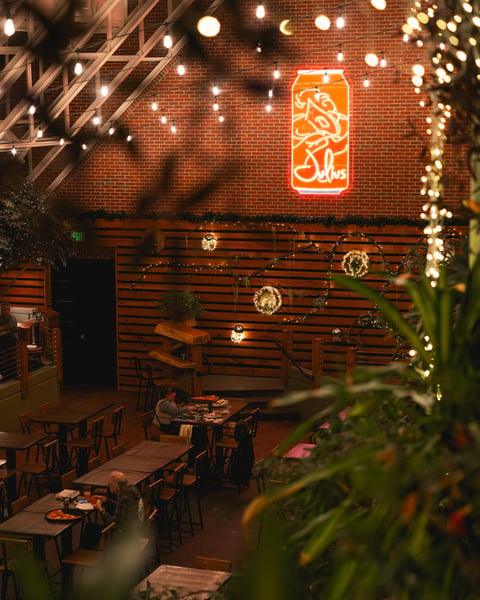 Spotted perched above the taproom at Tree House in Deerfield, a big ol’ Julius Can neon.