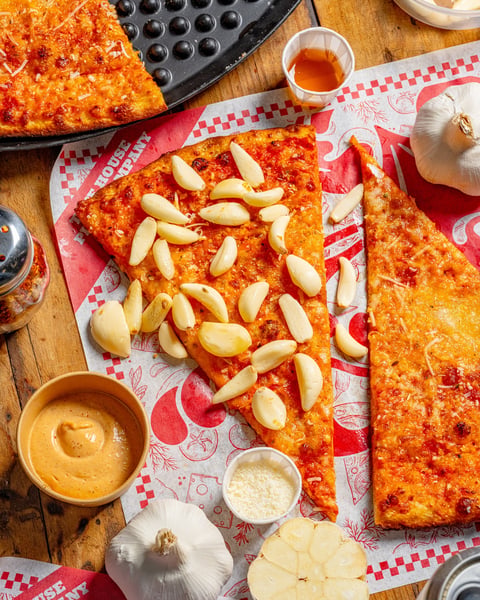 This month’s pizza of the month: Garlic Confit Cheese.