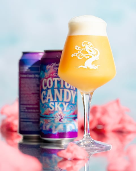 Cotton Candy Skies is a Double IPA inspired by the fleeting magic of a setting sun. Citra, Amarillo, Simcoe, and Stra…