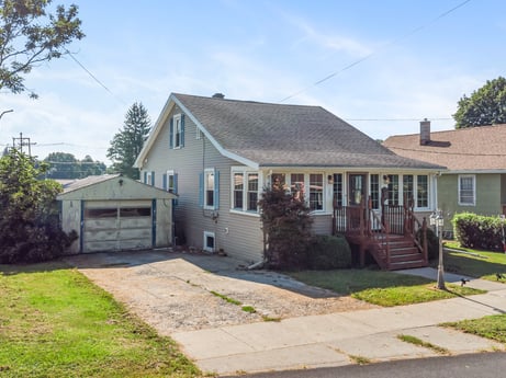 An image featuring plant, building, sky, window, cloud, tree, house, land lot, grass, door at 132 Wilbur St.
