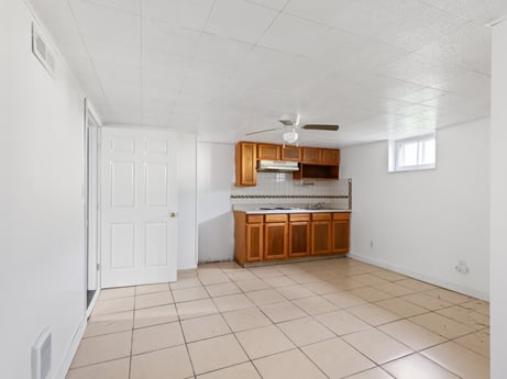 An image featuring cabinetry, wood, building, lighting, fixture, interior design, drawer, house, hardwood, flooring at 203 Harrison St.